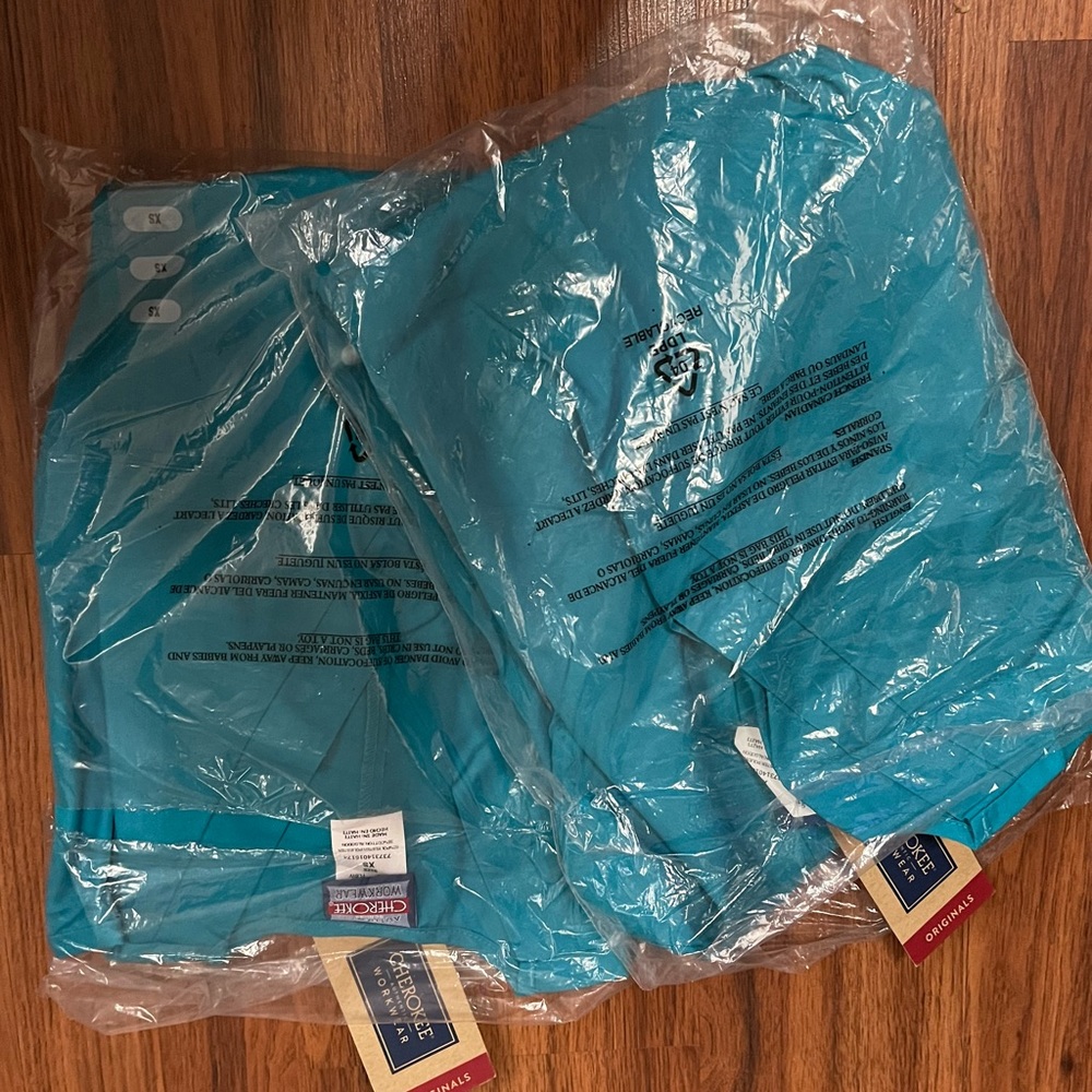 Turquoise Cherokee scrub shirts (2pair)